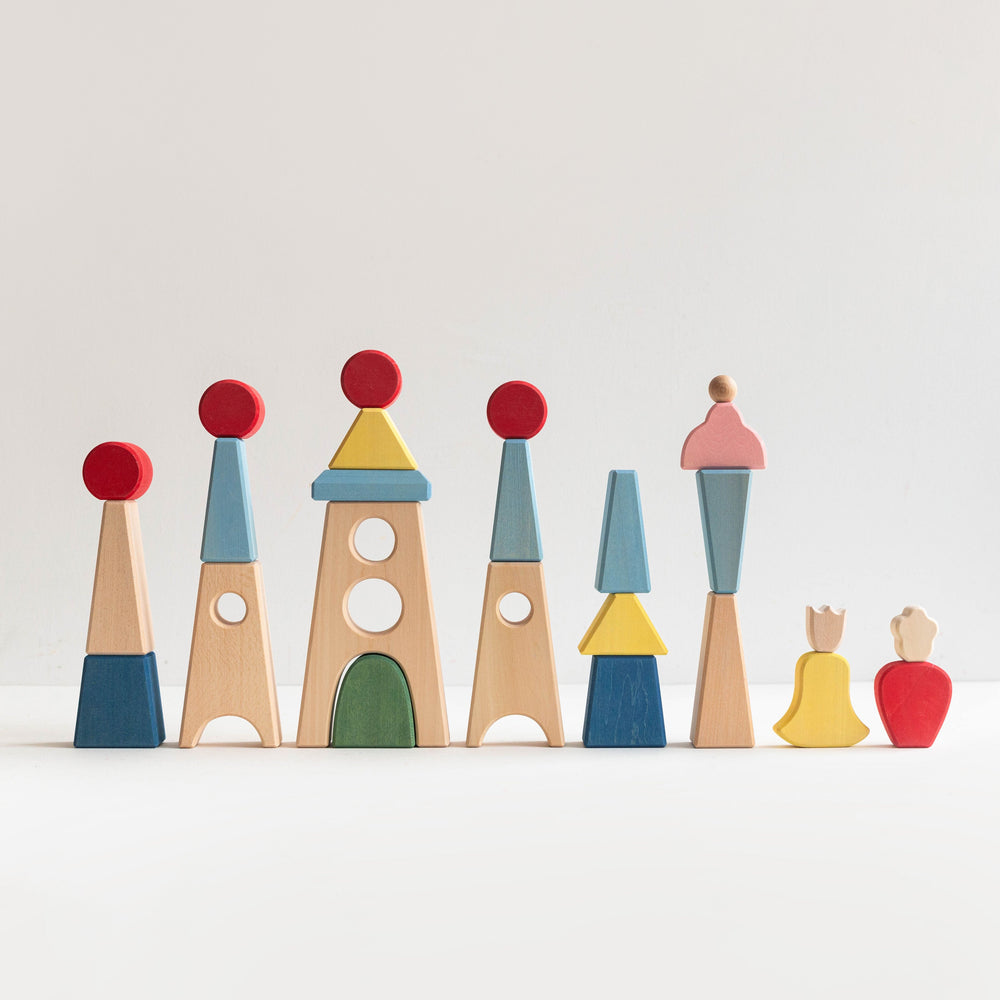 Set of colorful toy castles on a white background