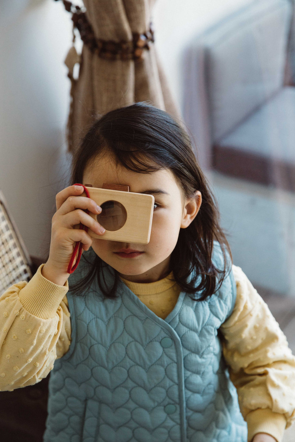 Kaleidoscope camera played by a little girl