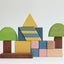Wooden blocks stacked in the shape of trees and mountain