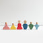 Set of colorful wooden peg dolls on a white background