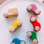 Six wooden cars in pink, red, green, blue, yellow and beige